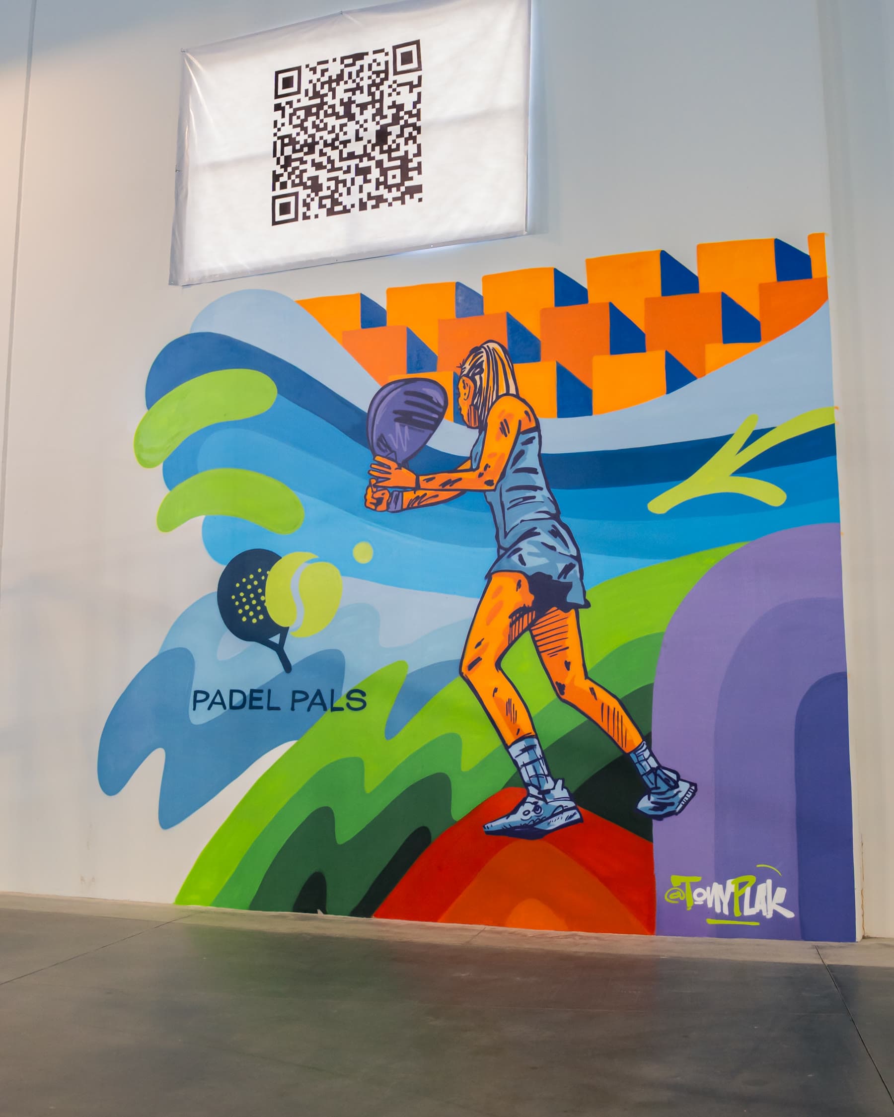 Padel Pals mural inside the club