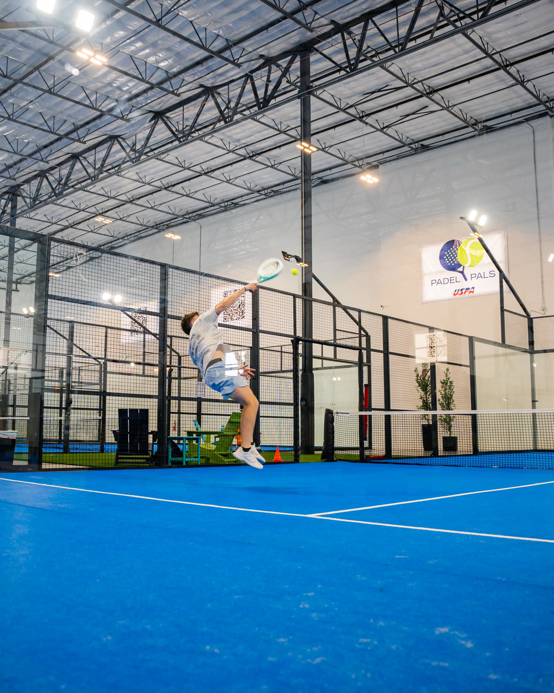 Indoor padel action at Padel Pals